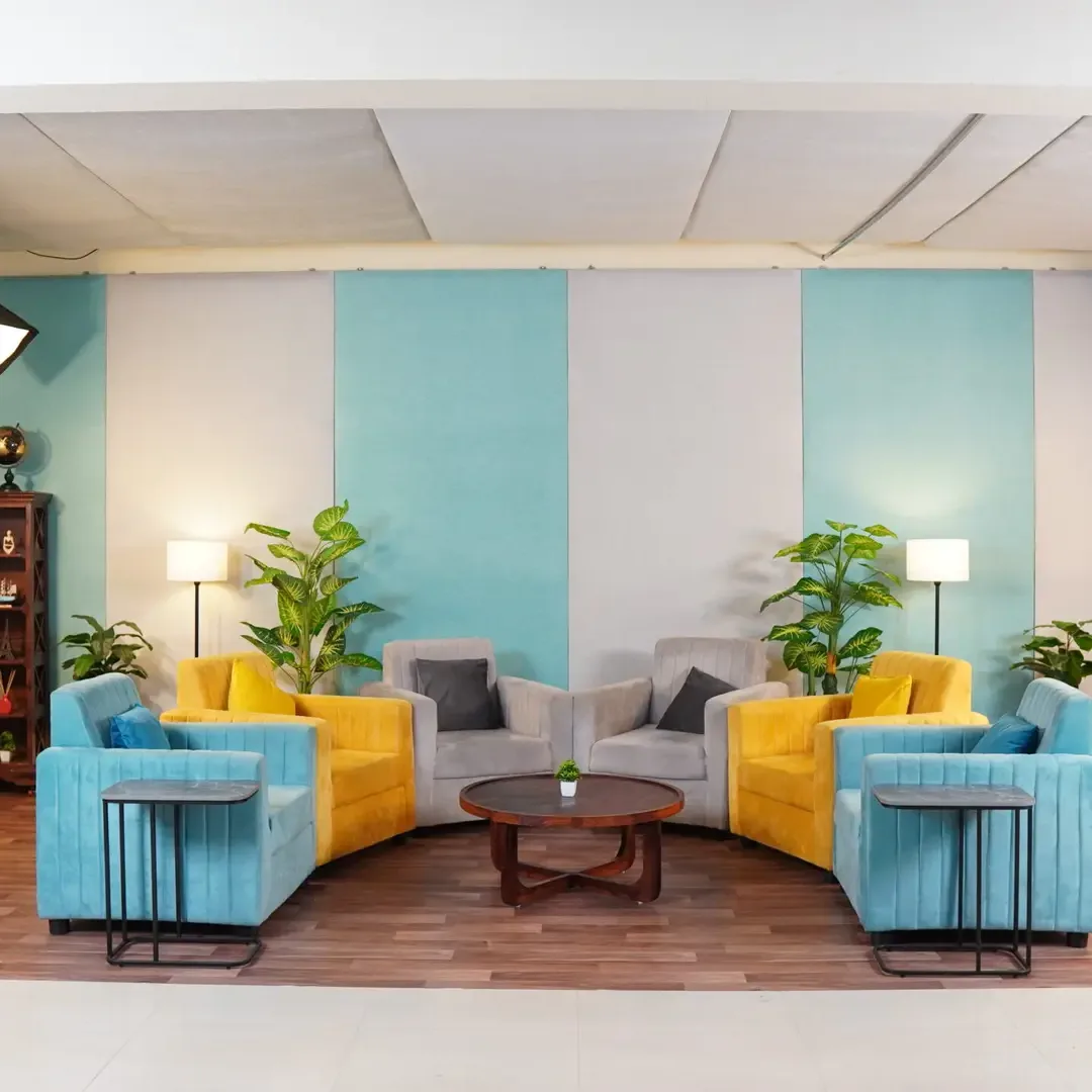 Modern video podcast studio for rent with vibrant background and 6 sofas